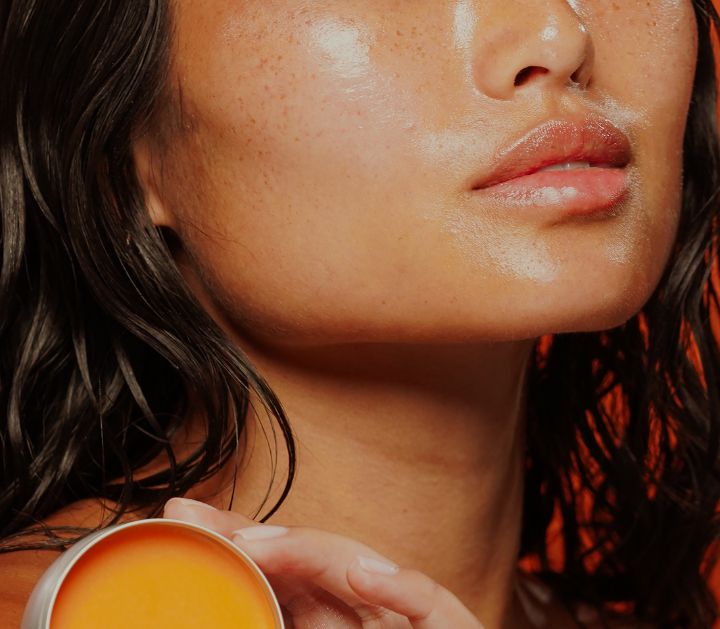 Model holding everything rescue balm